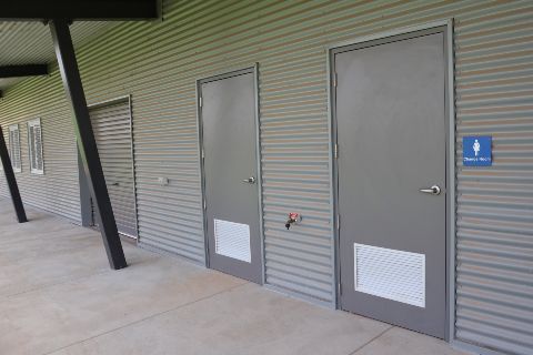Sentry 200.80 Custom Door with Air Relief Grilles Toilet Block