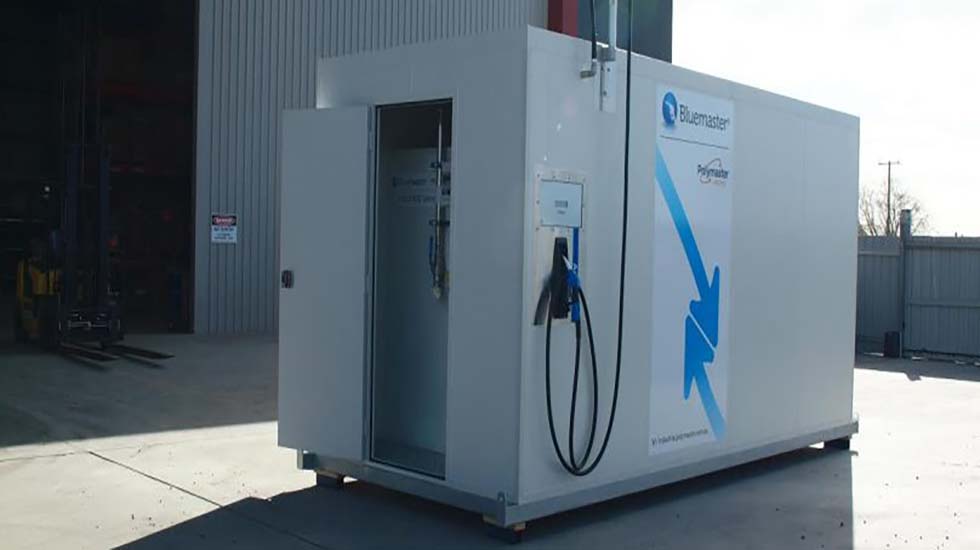 A transportable building unit with a secure Larnec door and external fuel pump station, designed for industrial or remote use
