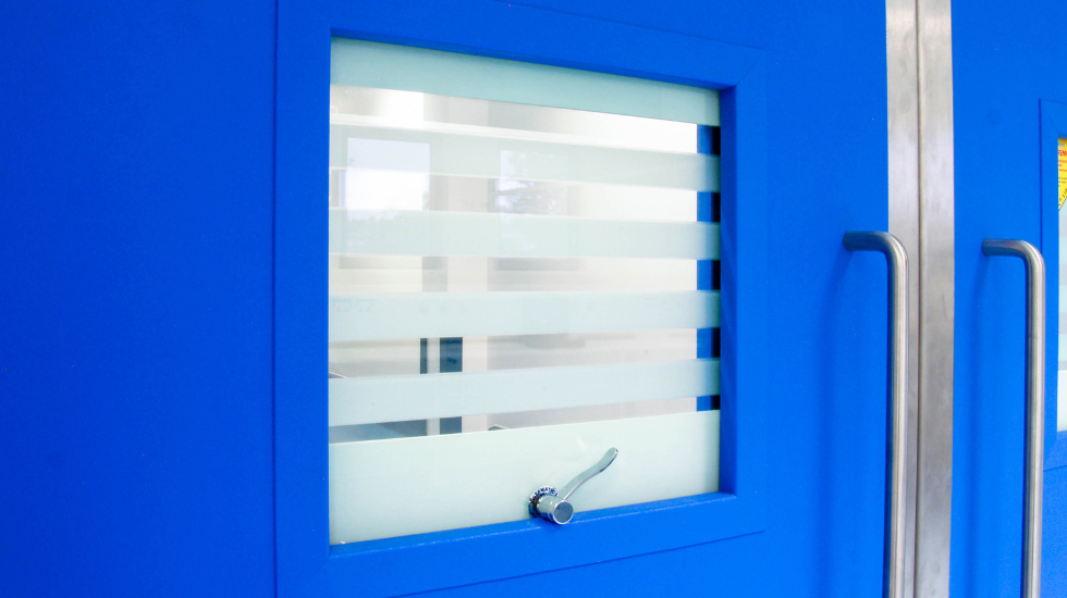 Blue vision panel door with secure glass louvers for enhanced visibility and safety