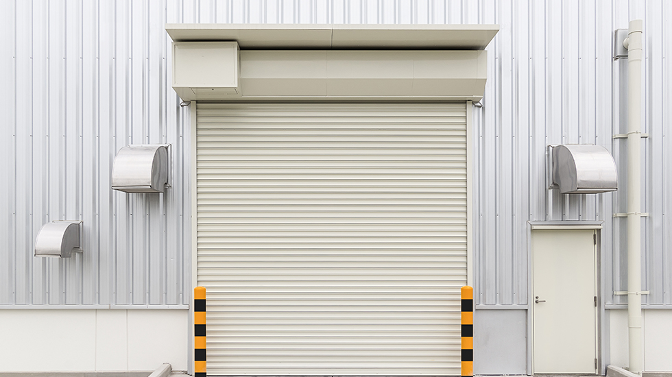 Roller door and personal access door