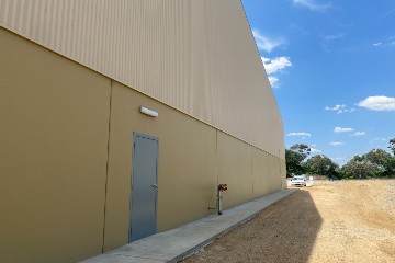 Tilt panel personal access door solutions